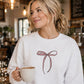 She Is Clothed Bow Graphic Sweatshirt - WHITE